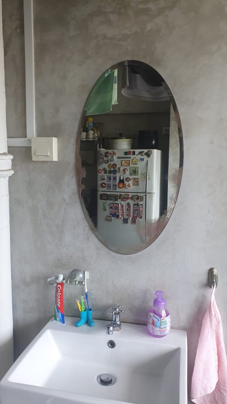 The existing mirror was removed prior to installation